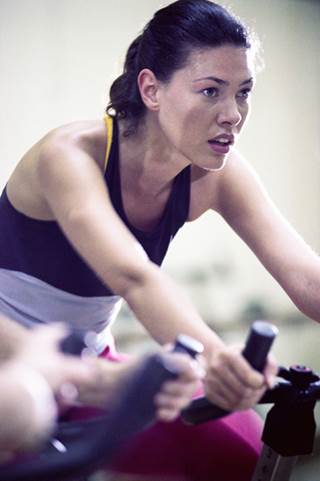 Muscle soreness in a fit young woman Muscle soreness in a fit young woman