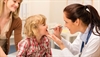 Auscultating a young patient