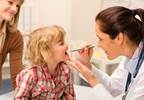 Auscultating a young patient Auscultating a young patient