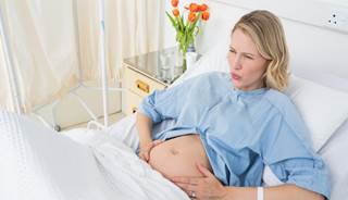 Early epidural timing best left up to mother Early epidural timing best left up to mother