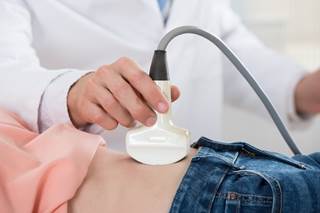 Formal ultrasonography by a radiologist may encourage less computerized tomography preoperatively. Formal ultrasonography by a radiologist may encourage less computerized tomography preoperatively.